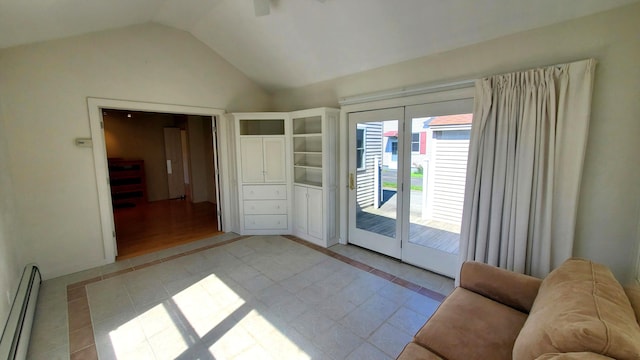 9 Wood St, Bangor, ME 04401 - entryway featuring a baseboard heating unit, light tile patterned floors, inlaid floor details, and vaulted ceiling