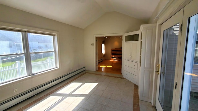 9 Wood St, Bangor, ME 04401 - unfurnished bedroom featuring a baseboard heating unit, lofted ceiling, and light tile patterned floors