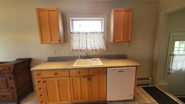9 Wood St, Bangor, ME 04401 - kitchen with white dishwasher, a baseboard heating unit, light tile patterned flooring, and light countertops
