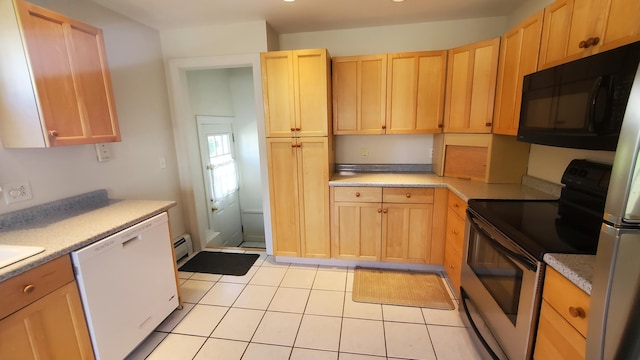 9 Wood St, Bangor, ME 04401 - kitchen with electric range, black microwave, white dishwasher, and light brown cabinets