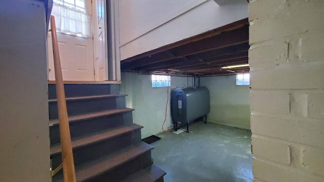 9 Wood St, Bangor, ME 04401 - basement featuring oil tank, stairs, and plenty of natural light