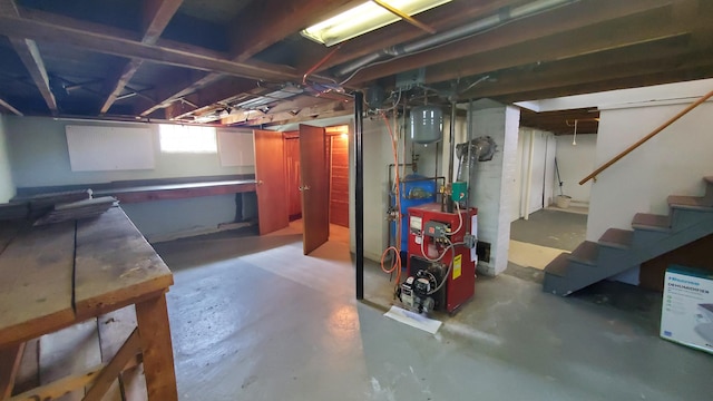 9 Wood St, Bangor, ME 04401 - basement featuring stairway and a heating unit