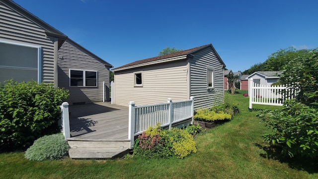 9 Wood St, Bangor, ME 04401 - view of home's exterior with a deck and a lawn