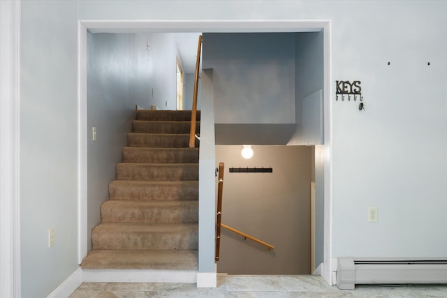 2 Bryer Heights Rd, Milford, ME 04461 - stairs with a baseboard heating unit and baseboards