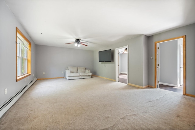 2 Bryer Heights Rd, Milford, ME 04461 - unfurnished room featuring baseboard heating, a ceiling fan, and carpet