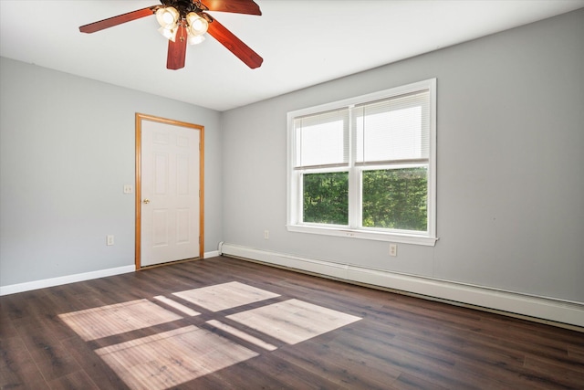 2 Bryer Heights Rd, Milford, ME 04461 - spare room featuring a baseboard heating unit, ceiling fan, and wood finished floors