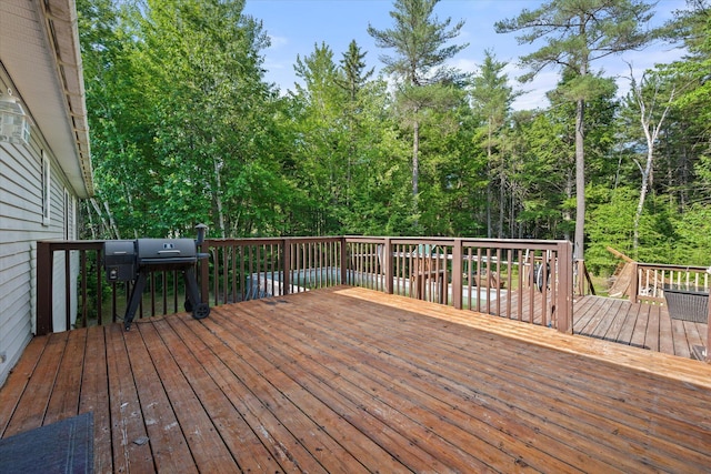 2 Bryer Heights Rd, Milford, ME 04461 - wooden deck featuring a grill