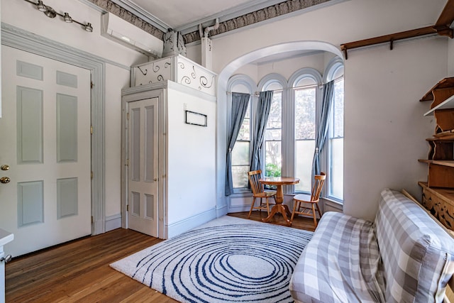 12 Deering St Unit 1, Portland, ME 04101 - living area with wood finished floors and arched walkways