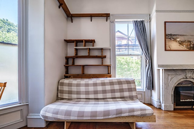12 Deering St Unit 1, Portland, ME 04101 - living area with wood finished floors and a fireplace