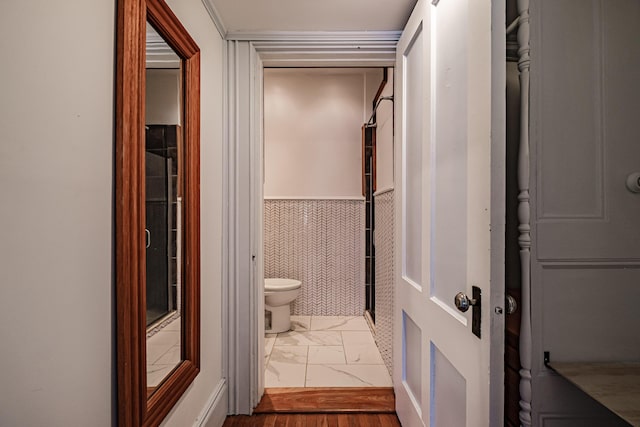 12 Deering St Unit 1, Portland, ME 04101 - bathroom with marble finish floors and a wainscoted wall