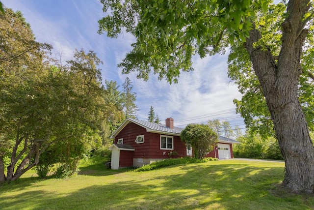103 Mountain View Rd, Farmington, ME 04938 - view of green lawn featuring an attached garage