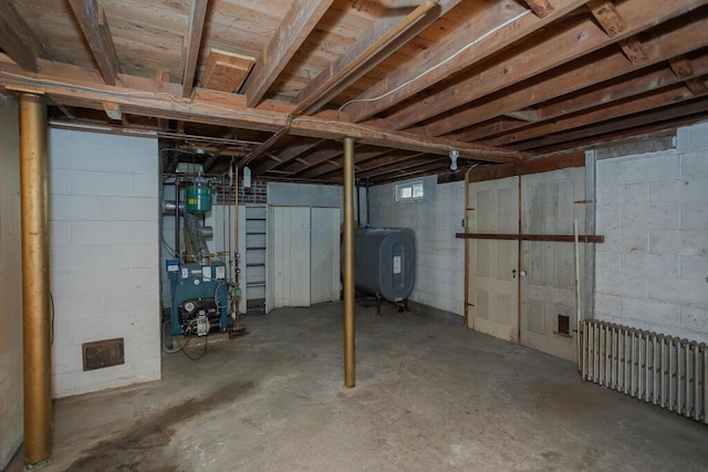 103 Mountain View Rd, Farmington, ME 04938 - below grade area featuring heating fuel, radiator heating unit, and a heating unit