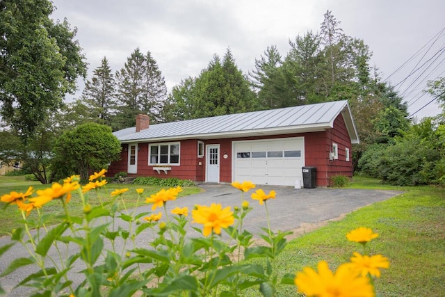 103 Mountain View Rd, Farmington, ME 04938 - ranch-style home with a garage, a chimney, a metal roof, a standing seam roof, and driveway