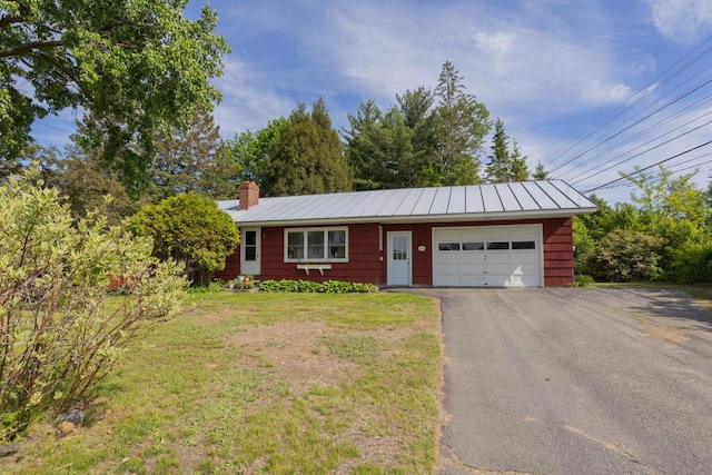 103 Mountain View Rd, Farmington, ME 04938 - ranch-style house featuring an attached garage, asphalt driveway, a chimney, a front yard, and a metal roof