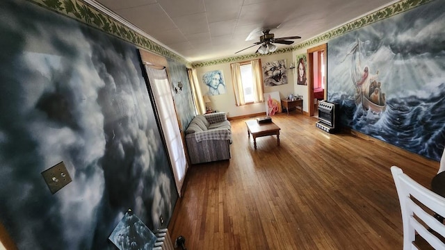28 Eastland Ave, Millinocket, ME 04462 - living room with wood finished floors, a ceiling fan, and wallpapered walls