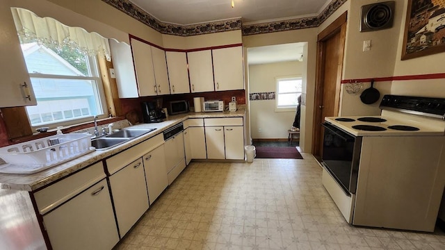 28 Eastland Ave, Millinocket, ME 04462 - kitchen featuring white appliances, light flooring, white cabinetry, and light countertops