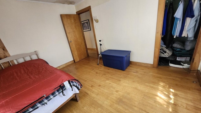 28 Eastland Ave, Millinocket, ME 04462 - bedroom with light wood finished floors and ornamental molding