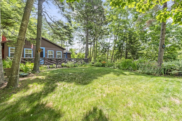 94 Crest Ave, Boothbay Harbor, ME 04538 - view of green lawn with a deck