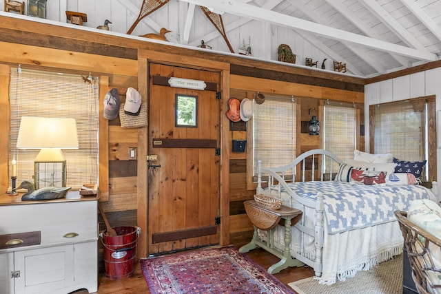 94 Crest Ave, Boothbay Harbor, ME 04538 - bedroom with wooden walls, wood finished floors, beamed ceiling, and high vaulted ceiling