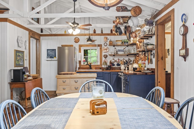 94 Crest Ave, Boothbay Harbor, ME 04538 - dining area with a ceiling fan and wood walls