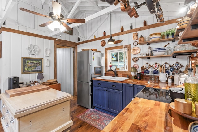 94 Crest Ave, Boothbay Harbor, ME 04538 - kitchen featuring wood counters, blue cabinetry, high quality fridge, a ceiling fan, and high vaulted ceiling