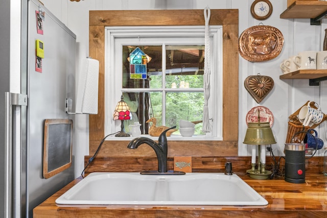 94 Crest Ave, Boothbay Harbor, ME 04538 - kitchen view of freestanding refrigerator and a sink