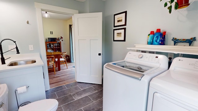 42 Hillside Rd, Orono, ME 04473 - laundry area featuring separate washer and dryer and dark tile patterned floors