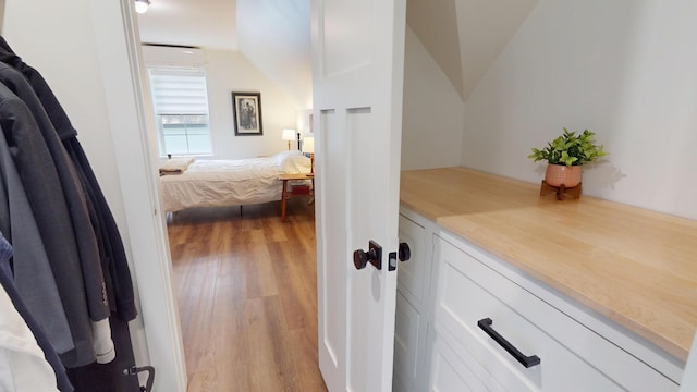 42 Hillside Rd, Orono, ME 04473 - ensuite bathroom with vaulted ceiling and wood finished floors