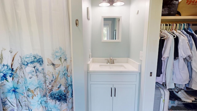 42 Hillside Rd, Orono, ME 04473 - full bathroom featuring vanity and a shower with shower curtain
