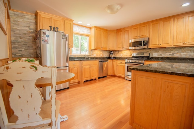 133 Ohio St, Millinocket, ME 04462 - kitchen featuring stainless steel appliances, light wood-type flooring, tasteful backsplash, light brown cabinets, and recessed lighting