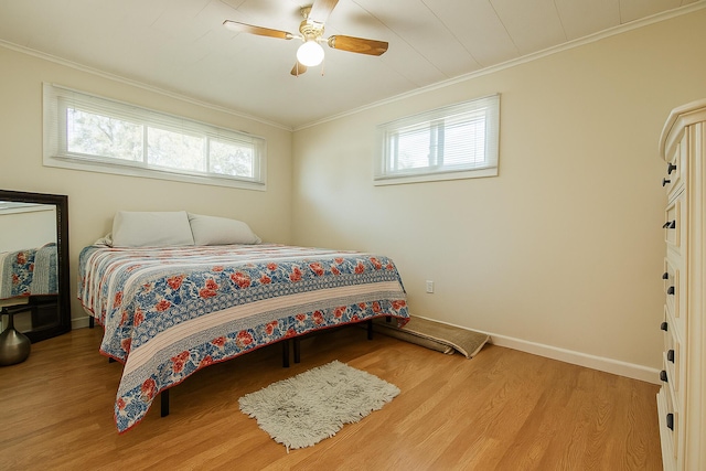 133 Ohio St, Millinocket, ME 04462 - bedroom with wood finished floors, ornamental molding, and a ceiling fan