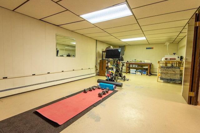 133 Ohio St, Millinocket, ME 04462 - exercise room with a baseboard radiator and a paneled ceiling