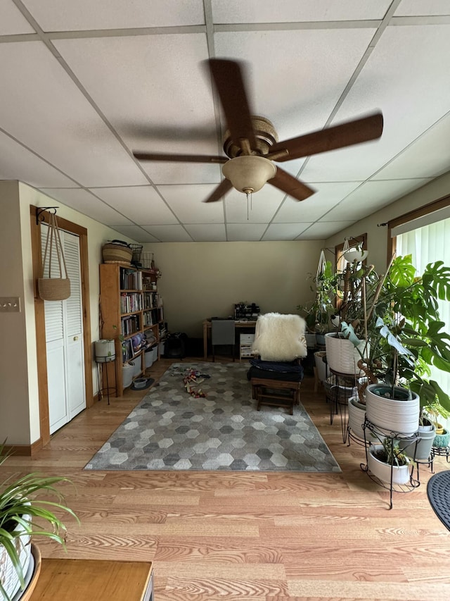 65 Quarry Rd, Sullivan, ME 04664 - sitting room featuring wood finished floors, ceiling fan, and a drop ceiling