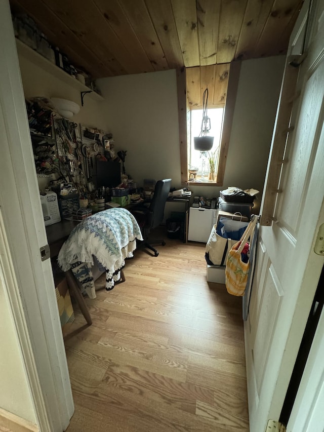 65 Quarry Rd, Sullivan, ME 04664 - bedroom with an office area, wood finished floors, and wooden ceiling