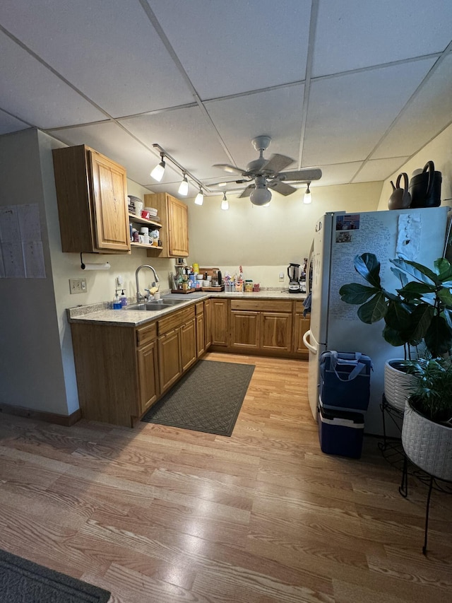 65 Quarry Rd, Sullivan, ME 04664 - kitchen featuring light wood-style floors, open shelves, freestanding refrigerator, a ceiling fan, and light countertops
