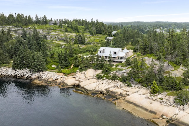 86 City Point Rd, Vinalhaven, ME 04863 - aerial view of property and surrounding area with a heavily wooded area