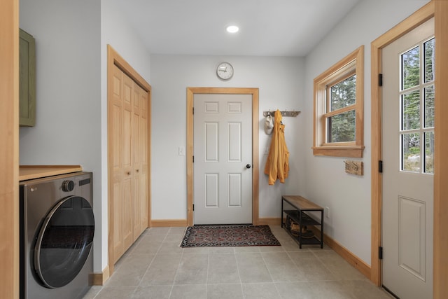 86 City Point Rd, Vinalhaven, ME 04863 - washroom with washer / dryer, recessed lighting, cabinet space, and light tile patterned floors