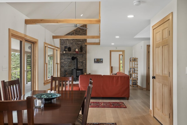 86 City Point Rd, Vinalhaven, ME 04863 - dining area featuring a wood stove, light wood-type flooring, recessed lighting, and ceiling fan