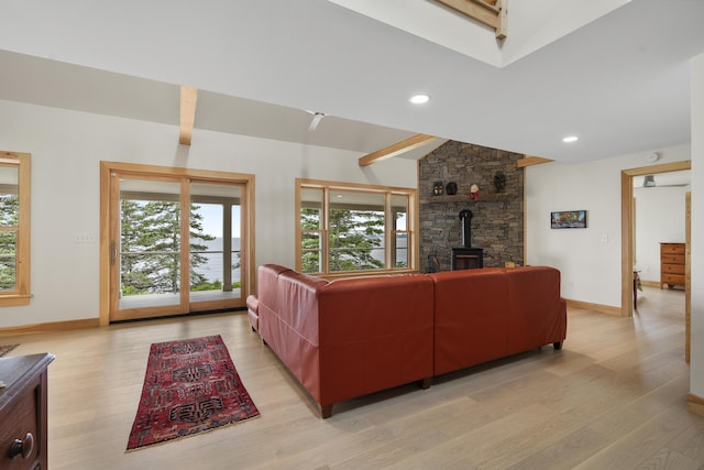 86 City Point Rd, Vinalhaven, ME 04863 - living room with a wood stove, light wood finished floors, recessed lighting, and beamed ceiling