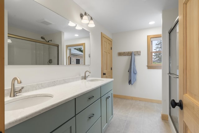 86 City Point Rd, Vinalhaven, ME 04863 - full bath with a shower stall, double vanity, tile patterned floors, and recessed lighting