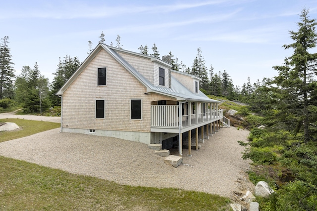 86 City Point Rd, Vinalhaven, ME 04863 - rear view of house with a wooden deck