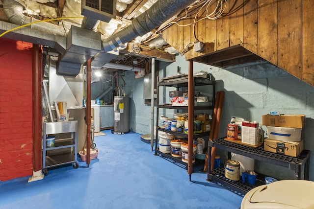 22 Cobb Rd, Bath, ME 04530 - unfinished below grade area with electric water heater and washer / clothes dryer