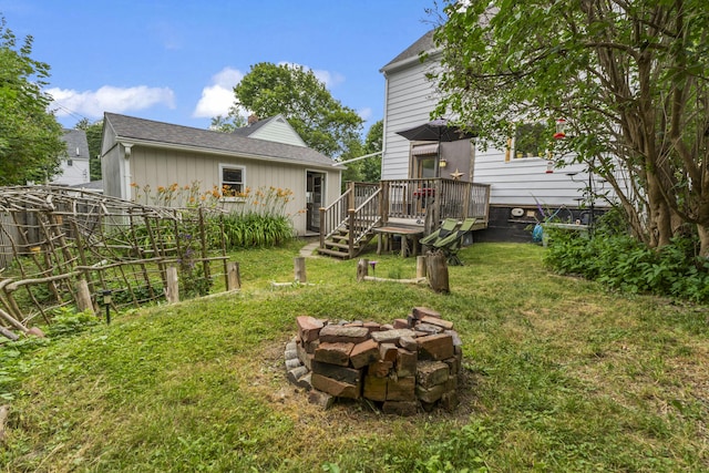 22 Cobb Rd, Bath, ME 04530 - view of yard with a wooden deck, an outdoor fire pit, and a garden