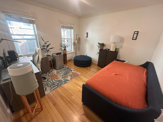 78 Mellen St Unit 2, Portland, ME 04101 - bedroom featuring light wood-style flooring and crown molding