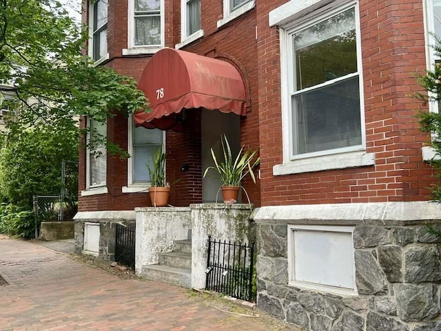 78 Mellen St Unit 2, Portland, ME 04101 - entrance to property featuring brick siding and stone siding