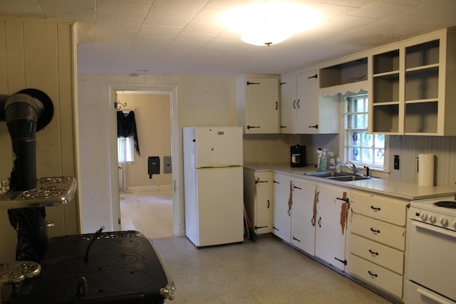 7 Maple St, Milbridge, ME 04658 - kitchen featuring white appliances, white cabinetry, light countertops, and light floors