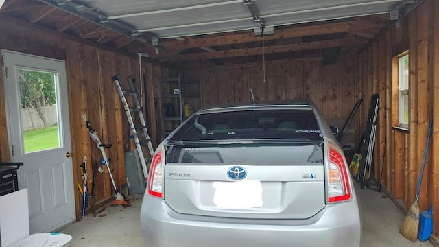 32 Highland Ave, Lincoln, ME 04457 - garage featuring wood walls