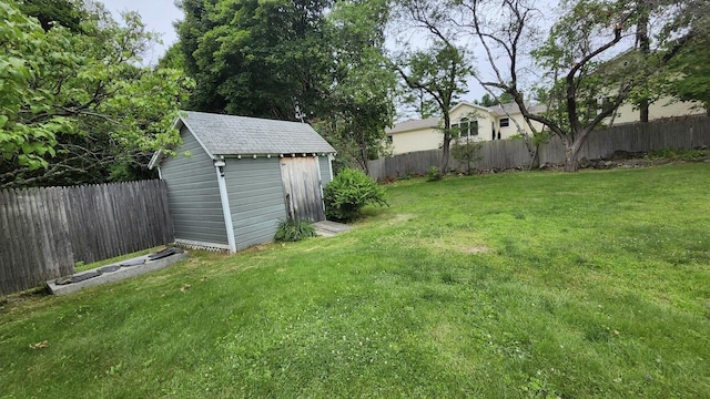 32 Highland Ave, Lincoln, ME 04457 - fenced backyard with a storage unit