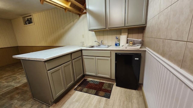 32 Highland Ave, Lincoln, ME 04457 - bar area with fridge and wooden walls