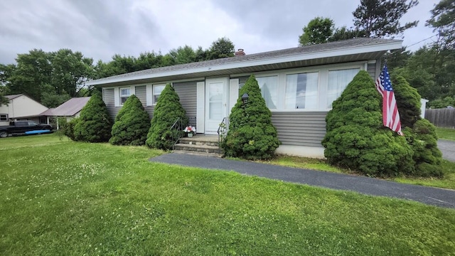 32 Highland Ave, Lincoln, ME 04457 - view of front of property featuring a front lawn